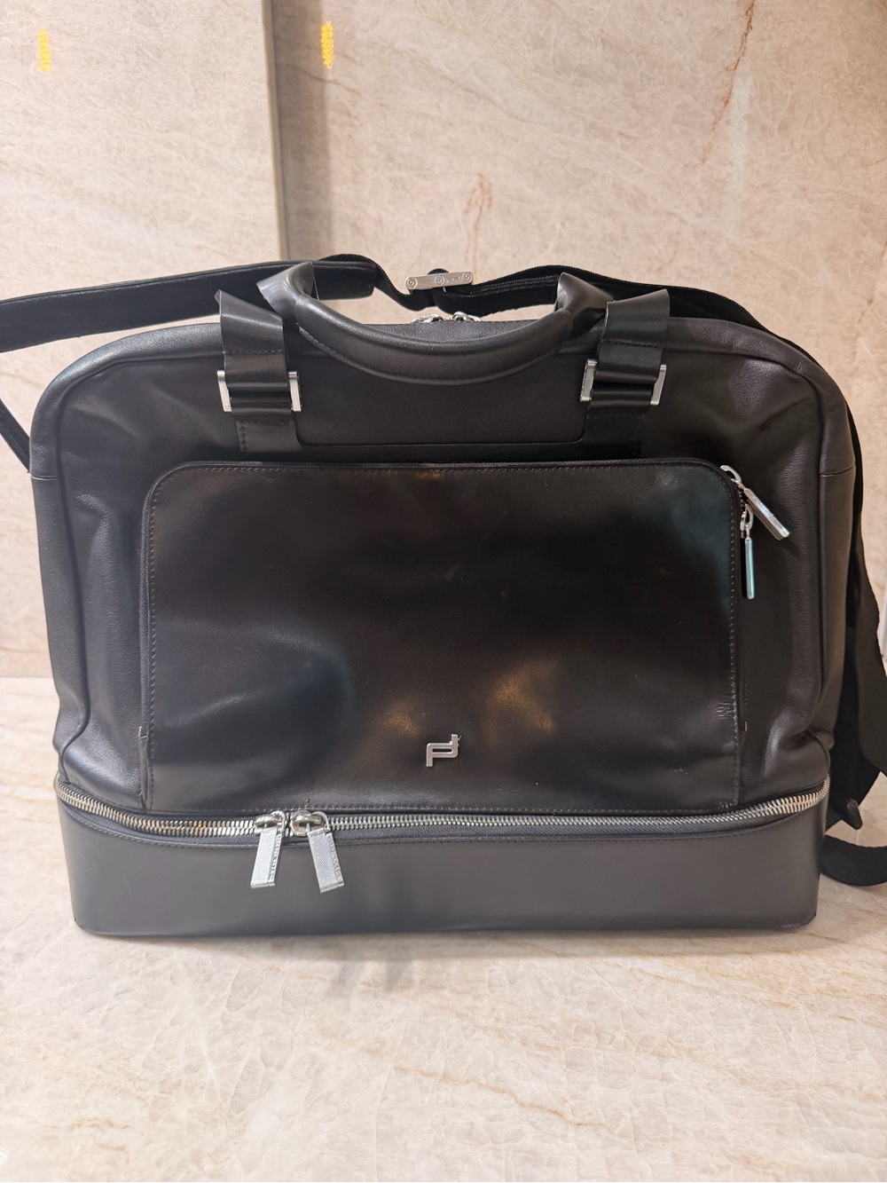 Porsche Design Black Leather Travel Bag with Multiple Pockets